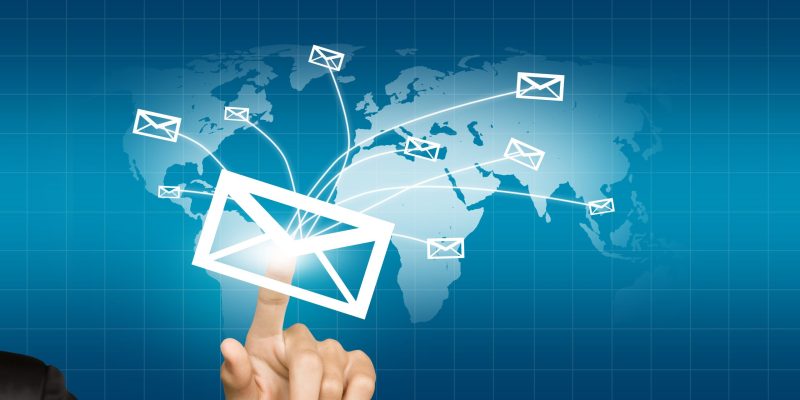 hand-pressing-envelope-that-is-sent-world-min